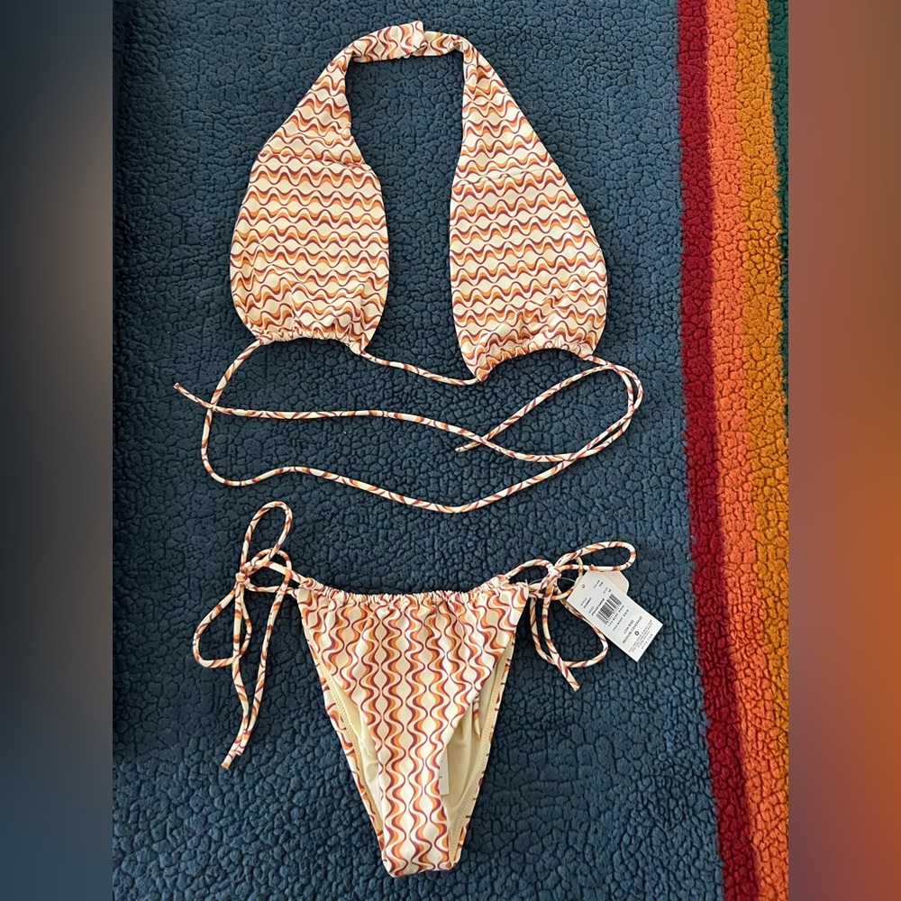 RVCA womens swimsuit. Large top. Small bottoms. New. Never worn. Tags attached.